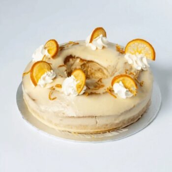 Send Orange Flavored Cake From Kitchen Cuisine in Pakistan