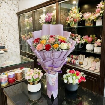 Send Colorful Burst Decent Mix Roses Bouquet in Pakistan